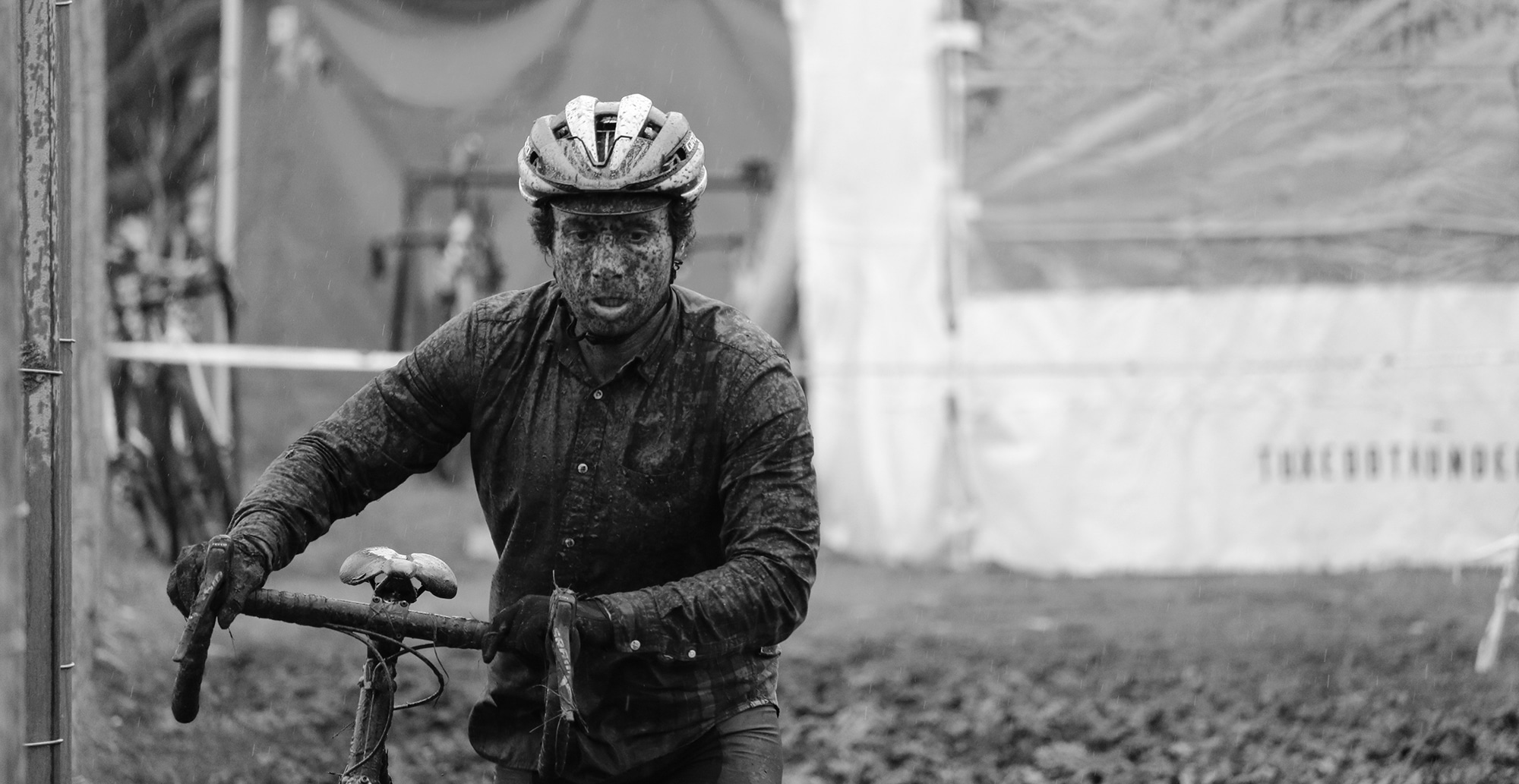 Muddy rider with cyclocross bike