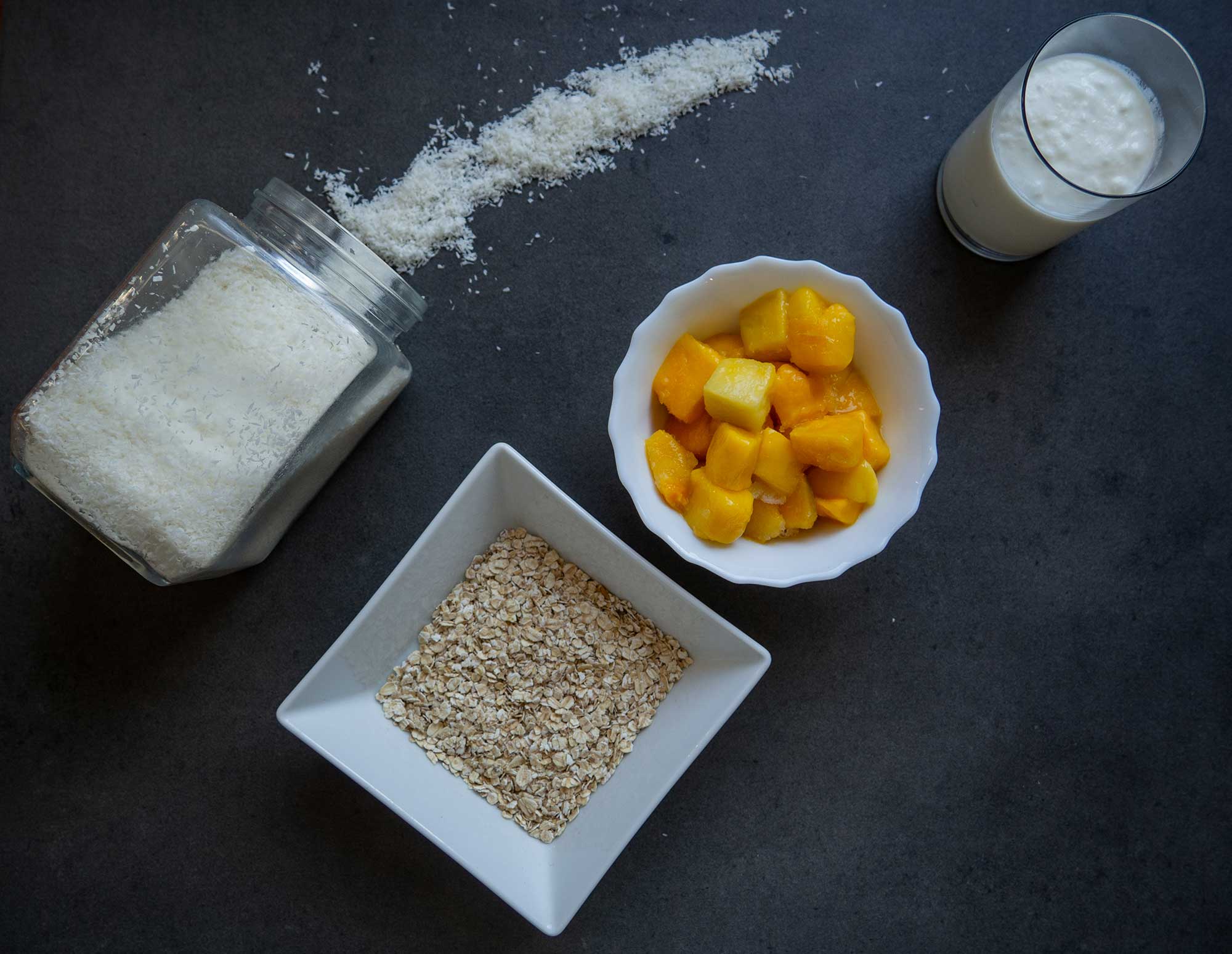 mango, oat flakes, coconut flakes, natural yogurt